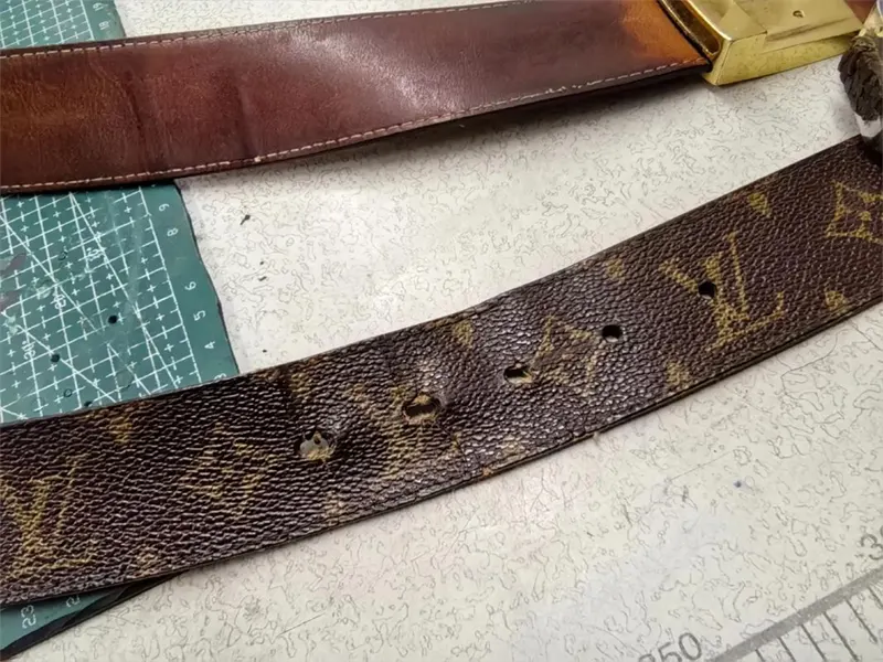 cracked and peeling genuine leather belt close-up